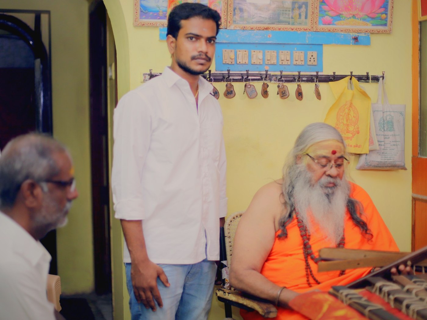 A reader with the swami of the library