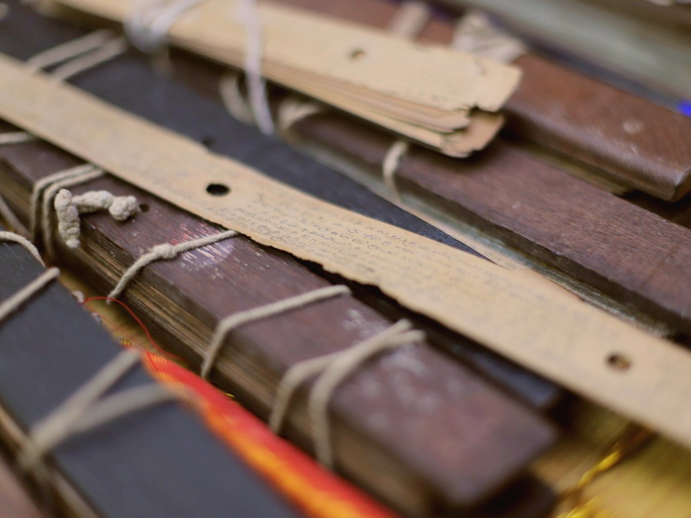 Palm-leaf manuscripts tied with cotton cord