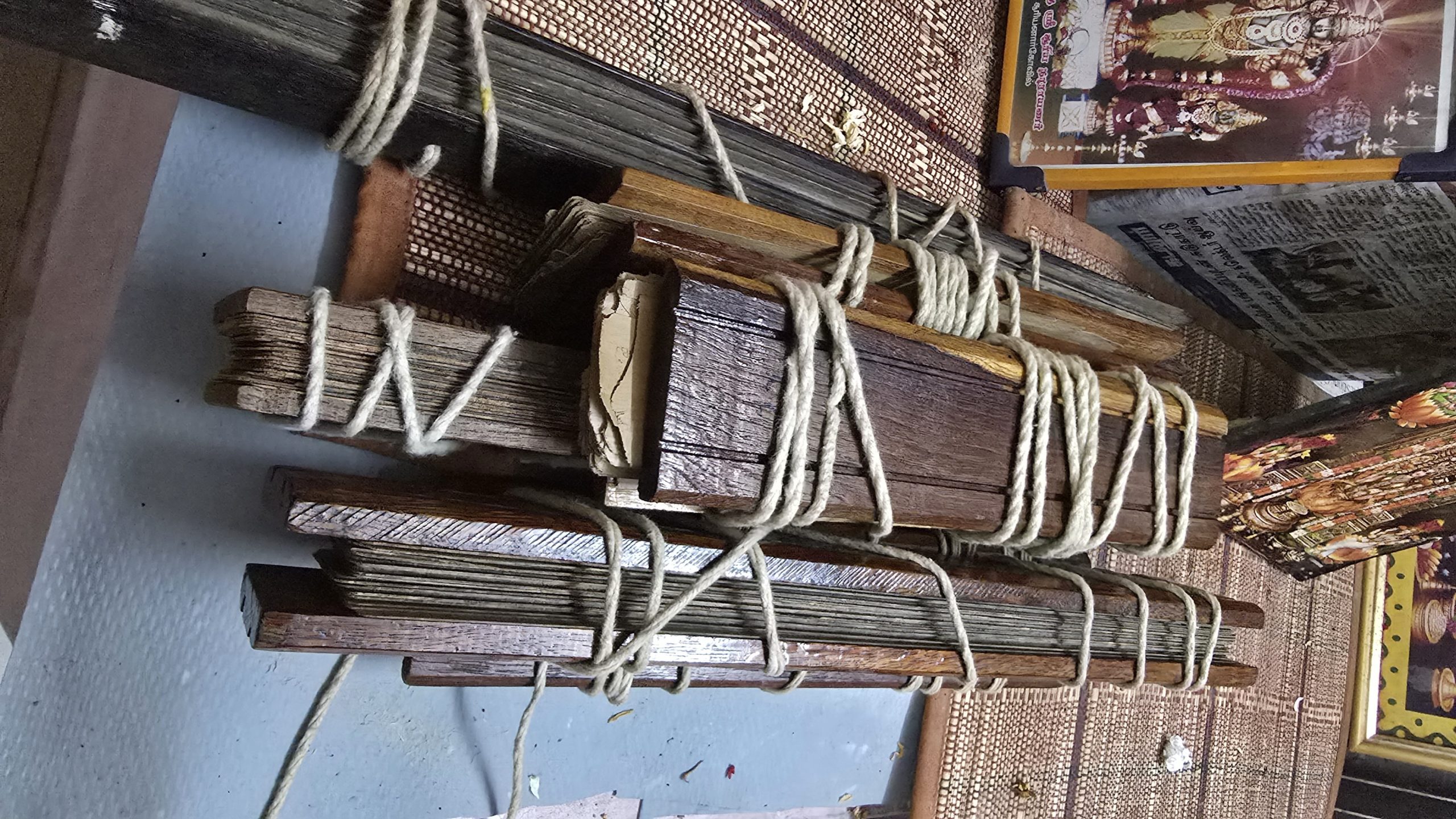 Bundles of ancient inscribed Nadi palm leaves tied in cloth