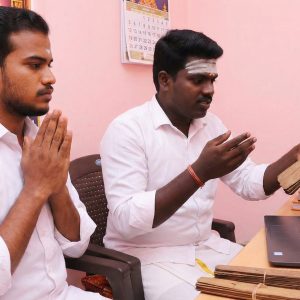 Our Nadi readers presenting a palm leaf during a live online reading session